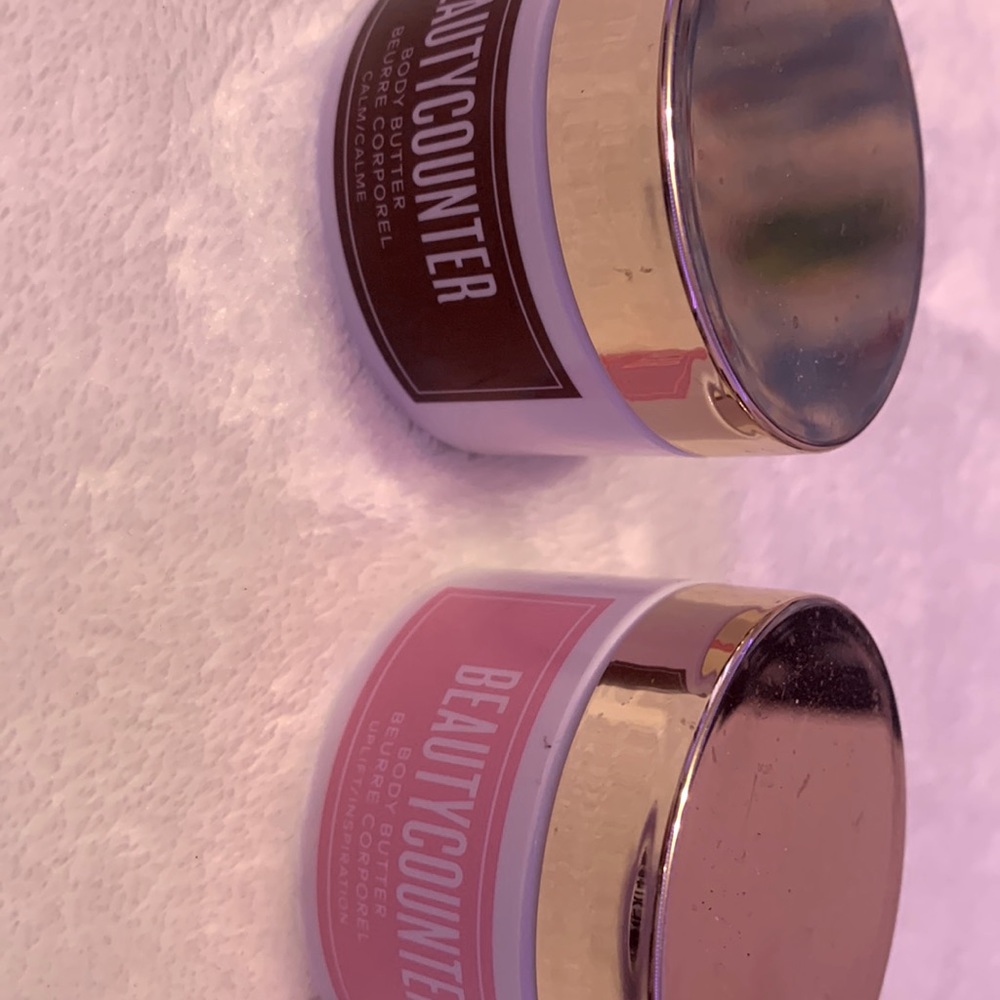 Two beautycounter body butters.